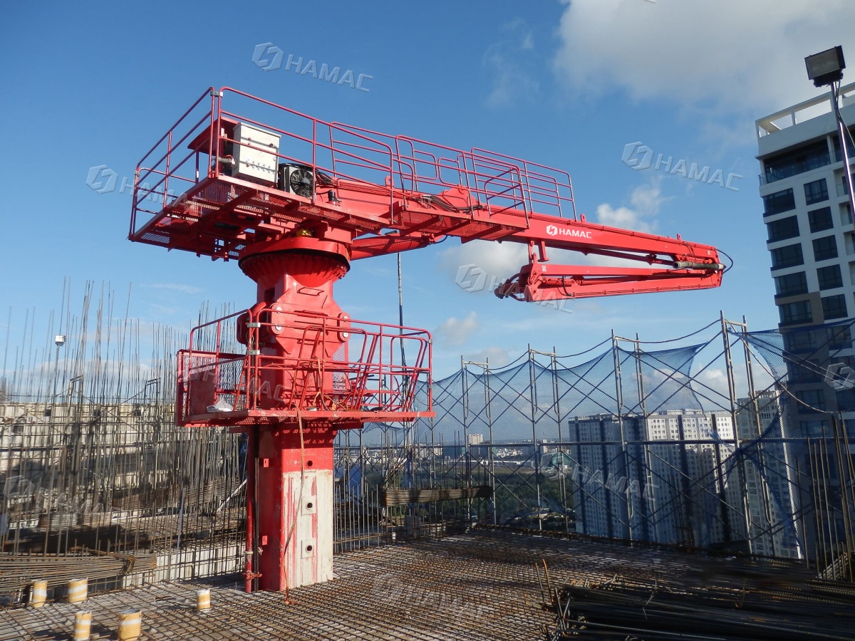 Self-climbing concrete placing boom for high-rise building and elevator shaft construction