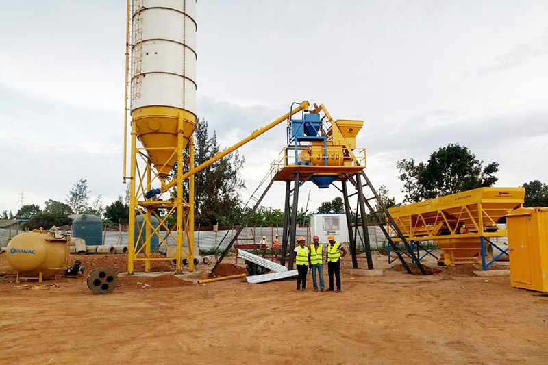 Technician took photos with concrete batching plant for sale