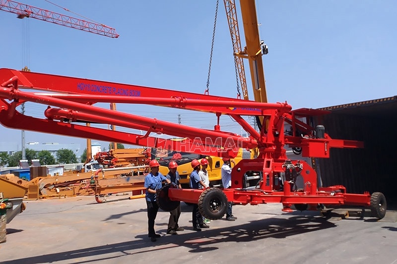 Mobile Concrete placing boom loaded into container